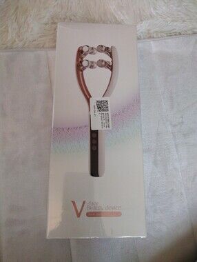 V-face Beauty Device Roller in Rose Gold and White